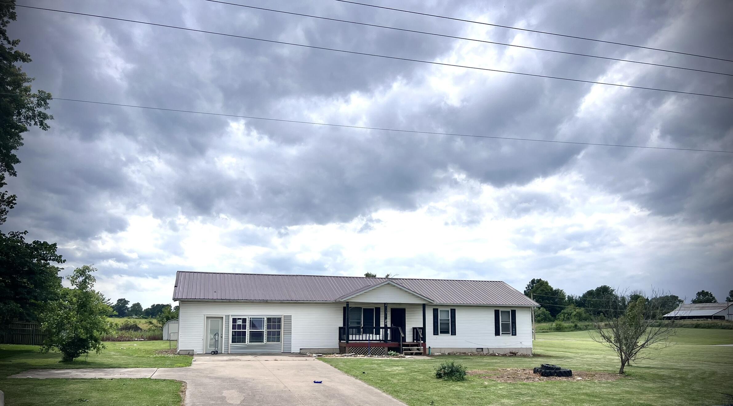 323 STATE ROAD AE Property Photo 1