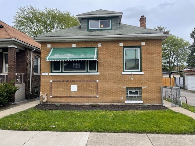 9141 S Colfax Avenue Property Photo 1