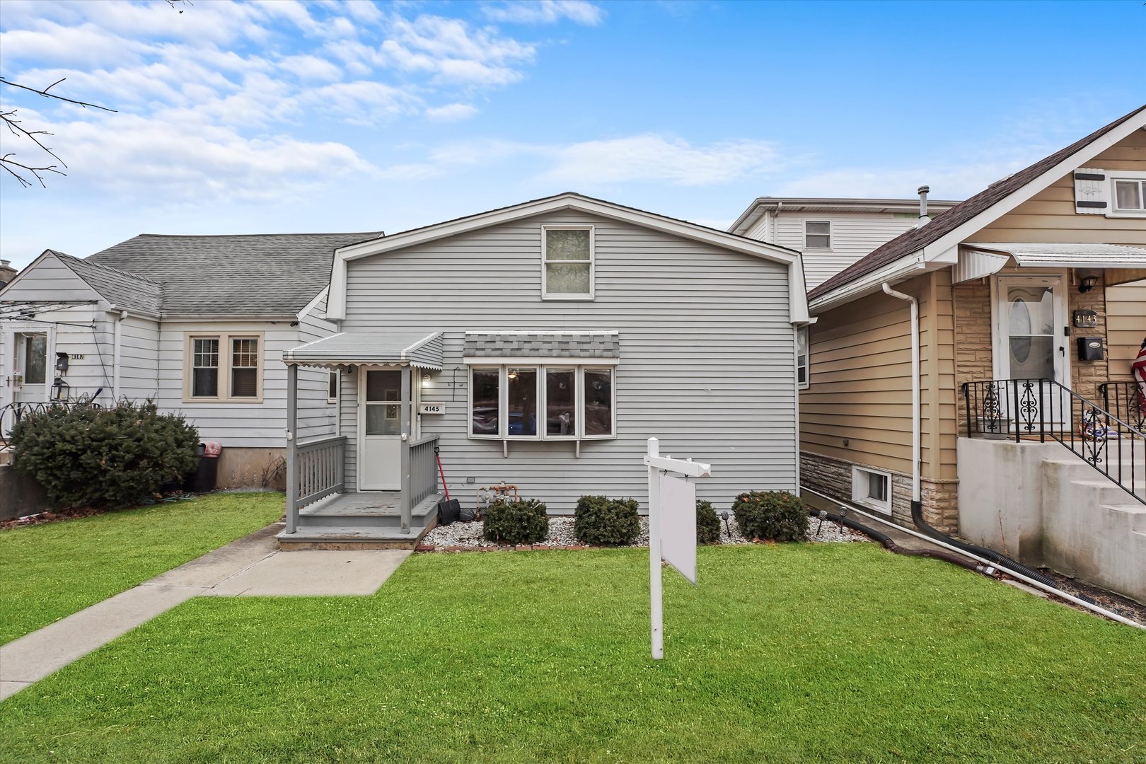 4145 N Ozanam Avenue Property Photo