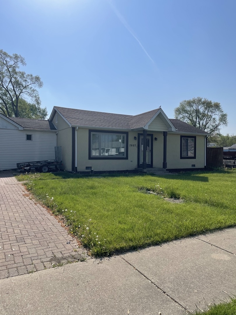 7927 S Lotus Ave Property Photo 1