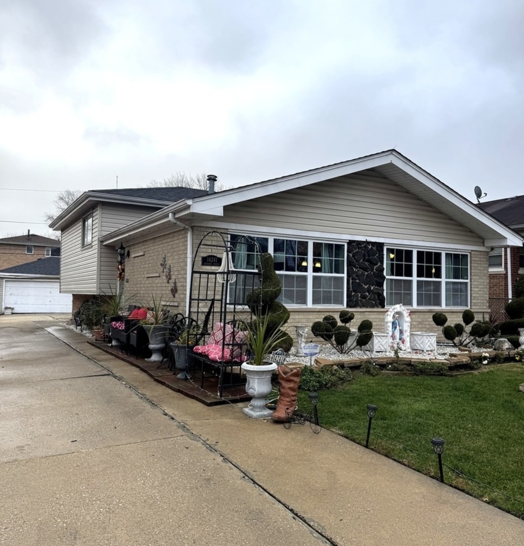 14241 S Marquette Avenue Property Photo 1