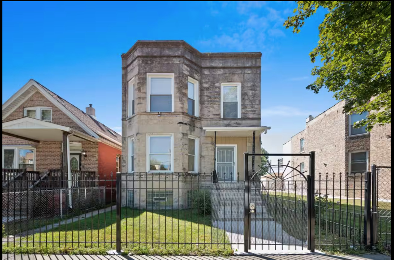 7144 S INGLESIDE Avenue Property Photo 1