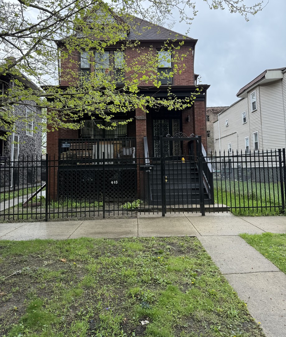 443 W 61st Place Property Photo 1