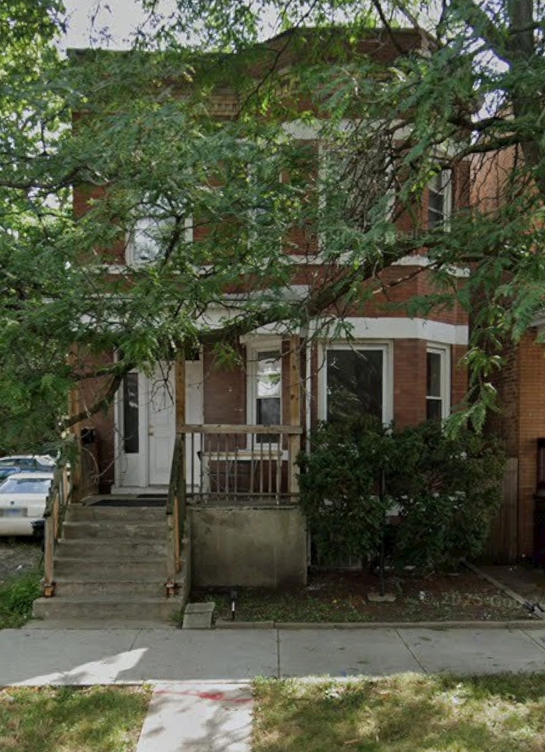 6959 S EBERHART Avenue Property Photo 1