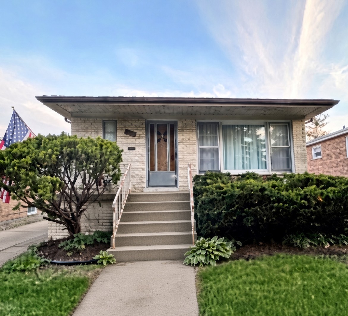 7719 W Jarvis Avenue Property Photo 1