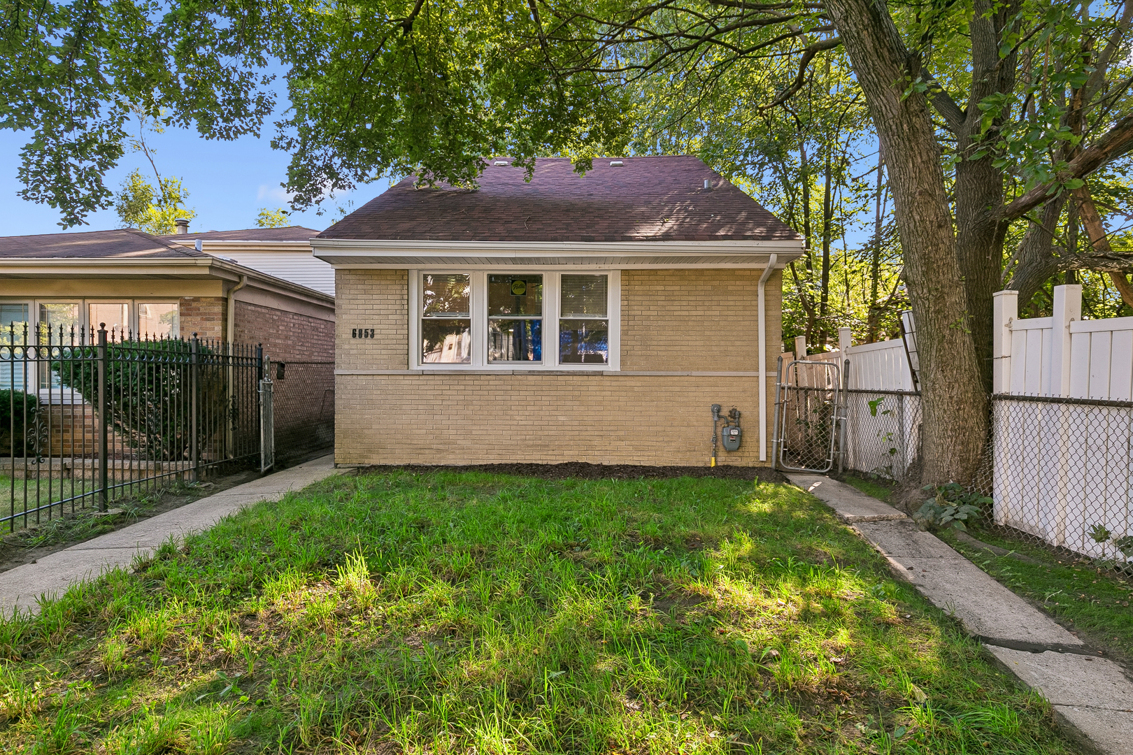 6853 S Langley Avenue Property Photo 1