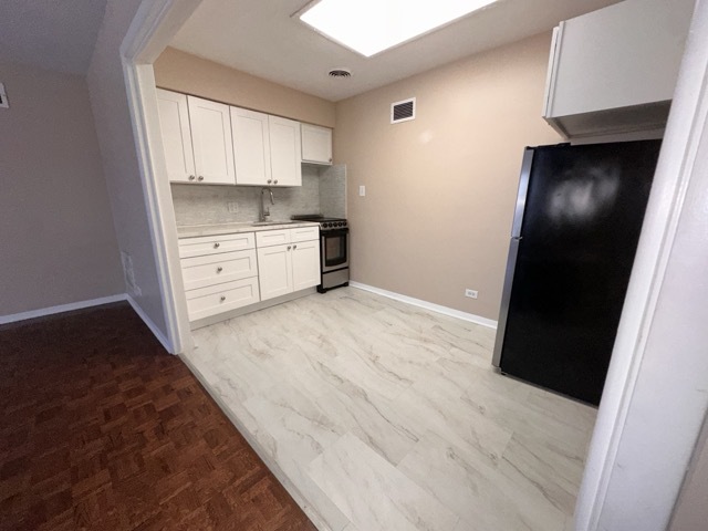 8701 S Mozart Avenue 3 Property Photo 3