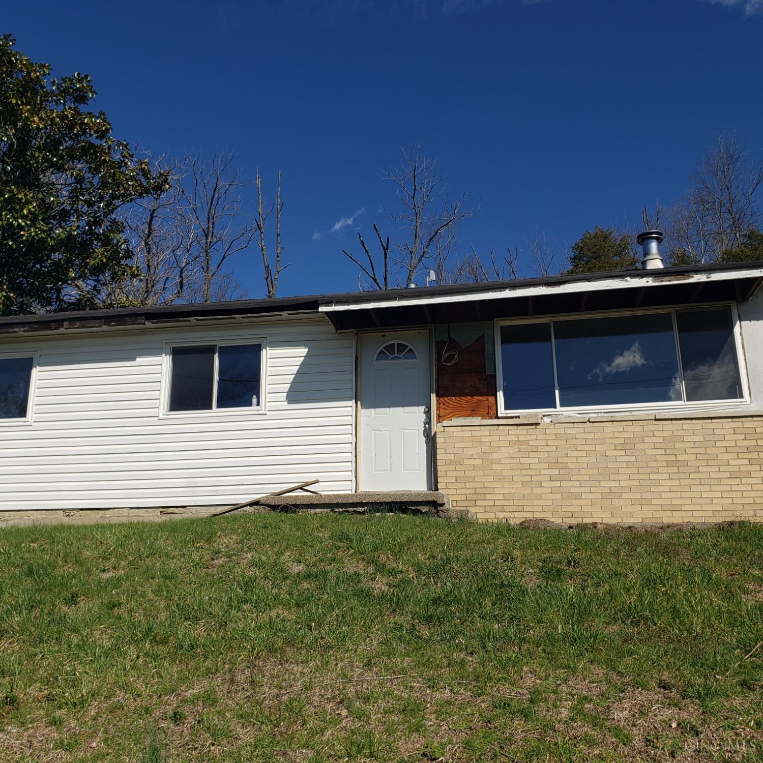 7390 E Miami River Rd Property Photo 1