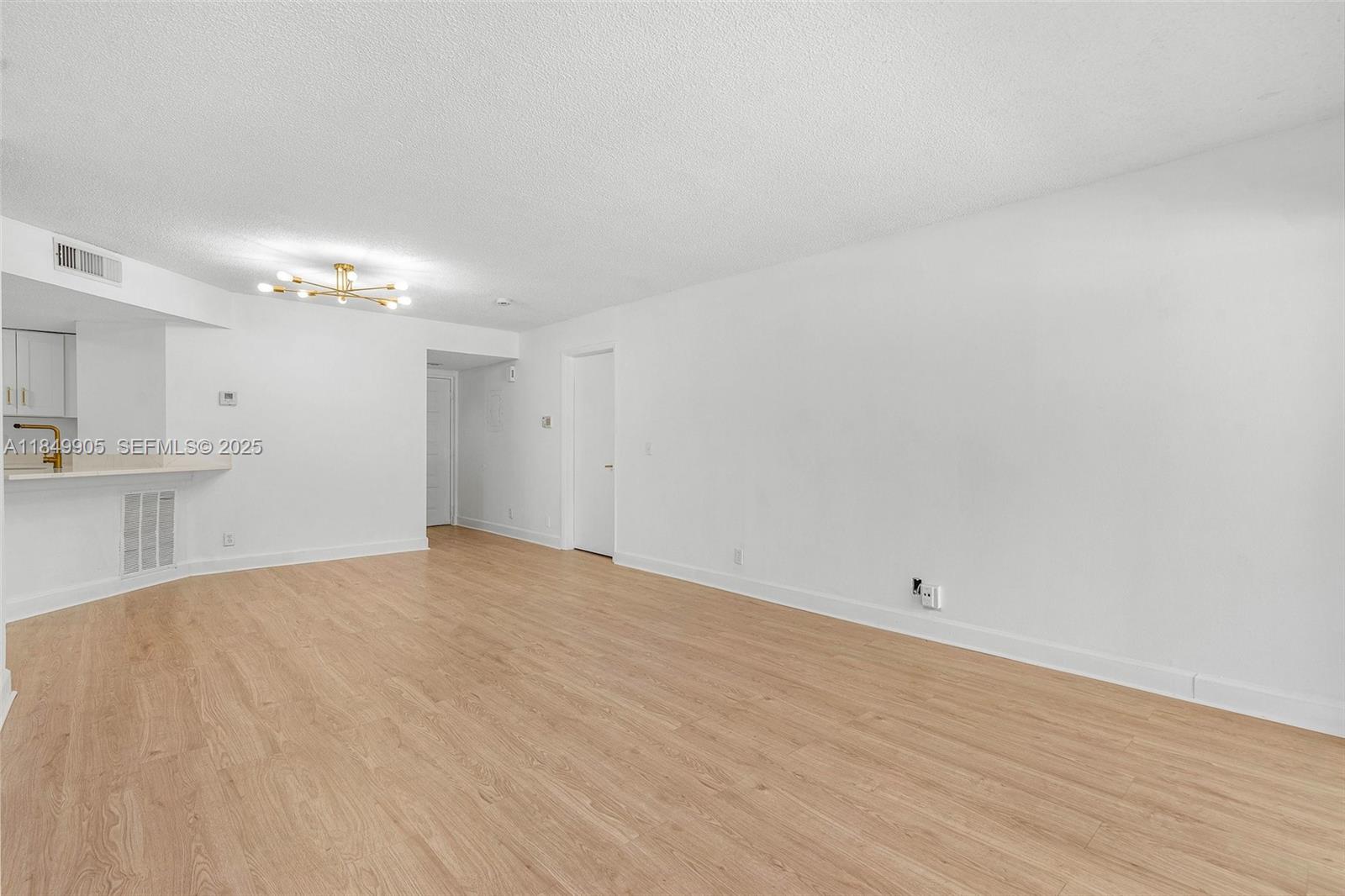 8721 Wiles Road 105 Property Photo 5