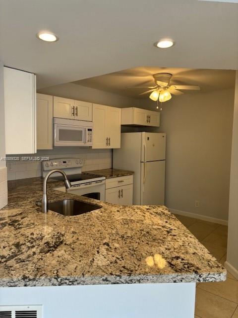8977 Wiles Road 103 Property Photo 1