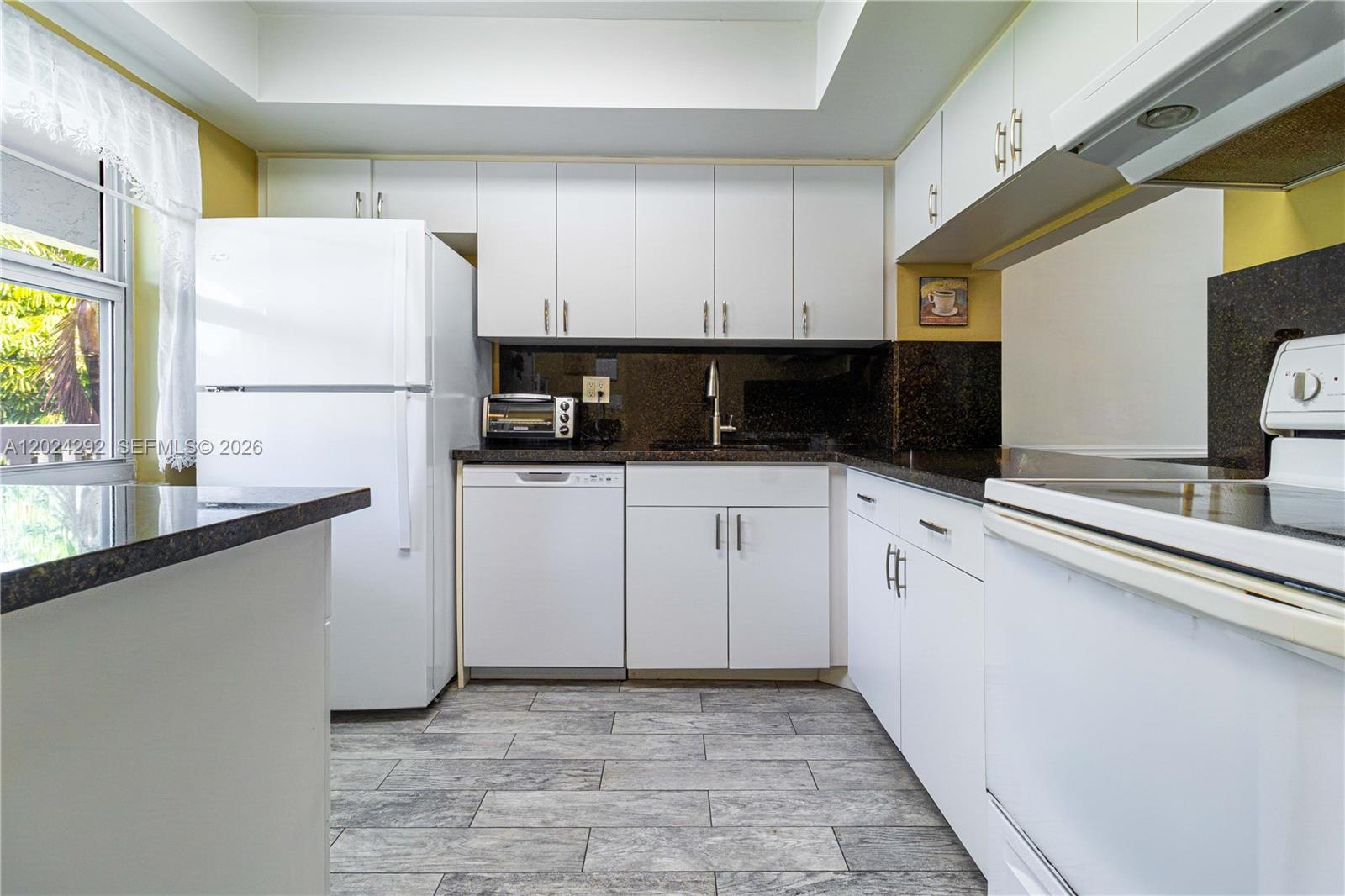 9780 N Marina Boulevard 424 Property Photo 1
