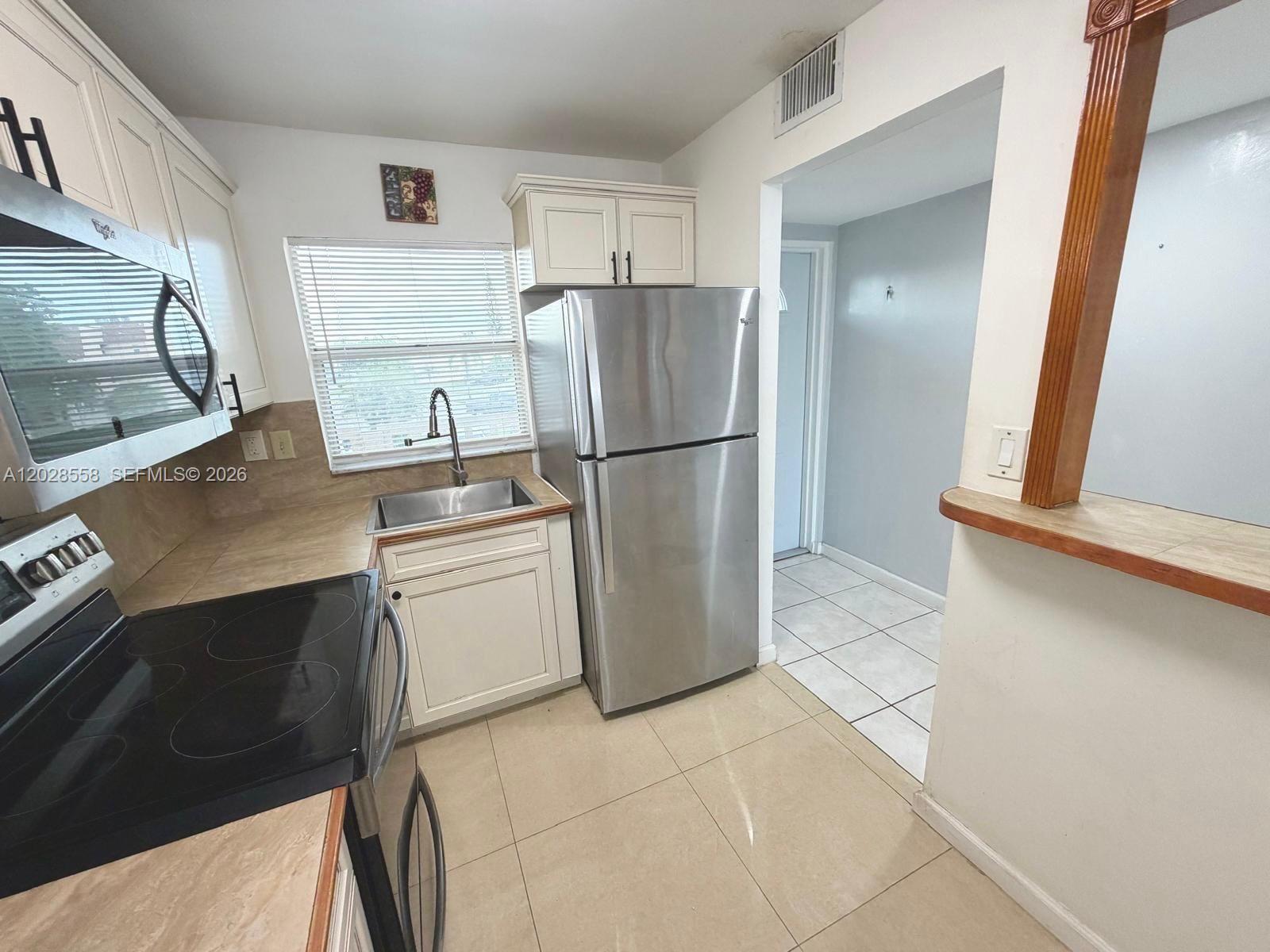 9281 Sunrise Lakes Boulevard 209 Property Photo 6