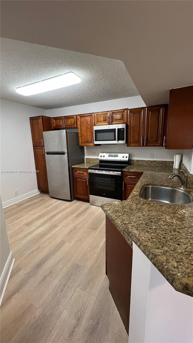 8851 Wiles Road 108 Property Photo 14