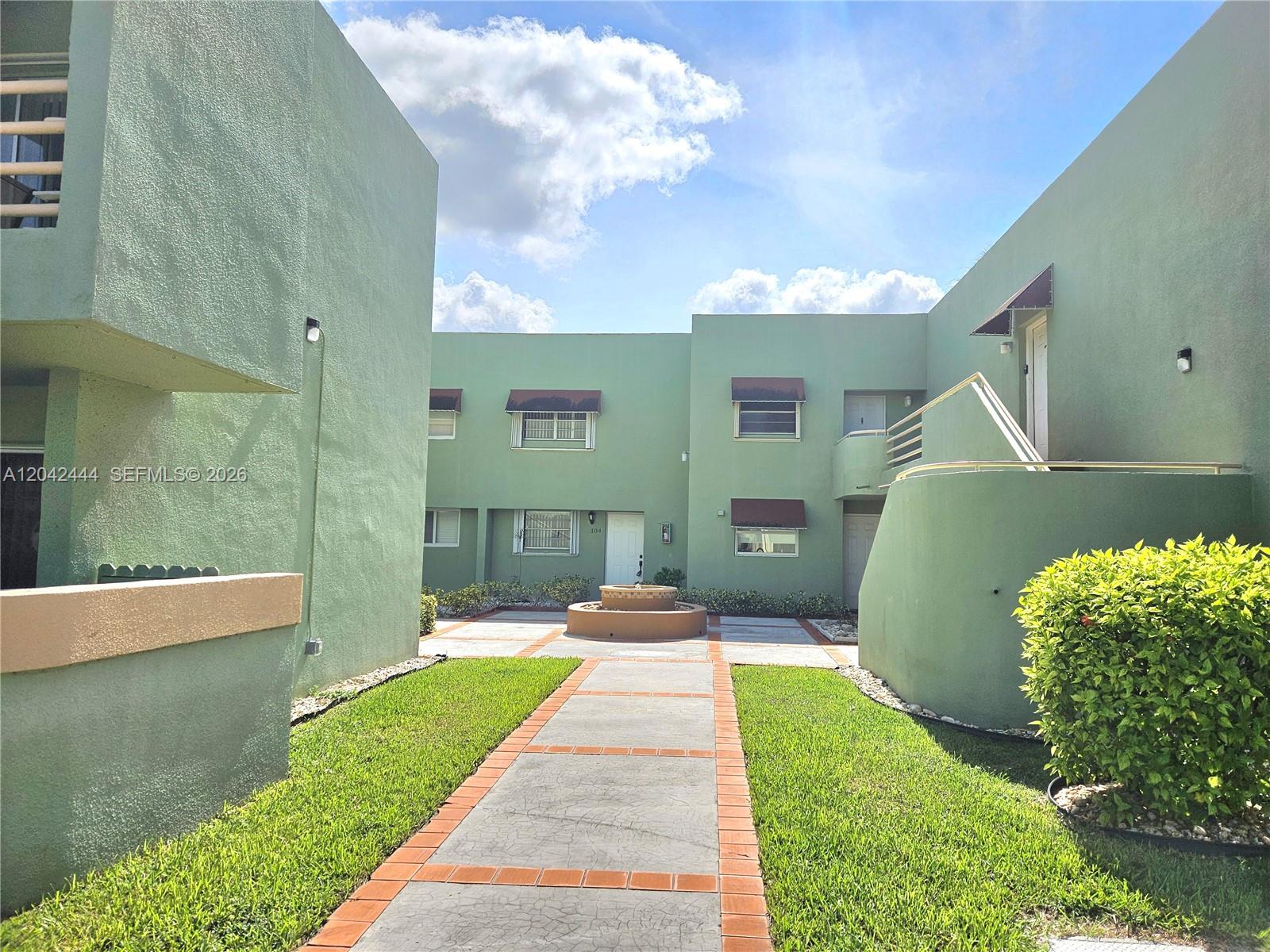 11071 Nw 7th Street 104-15 Property Photo 2