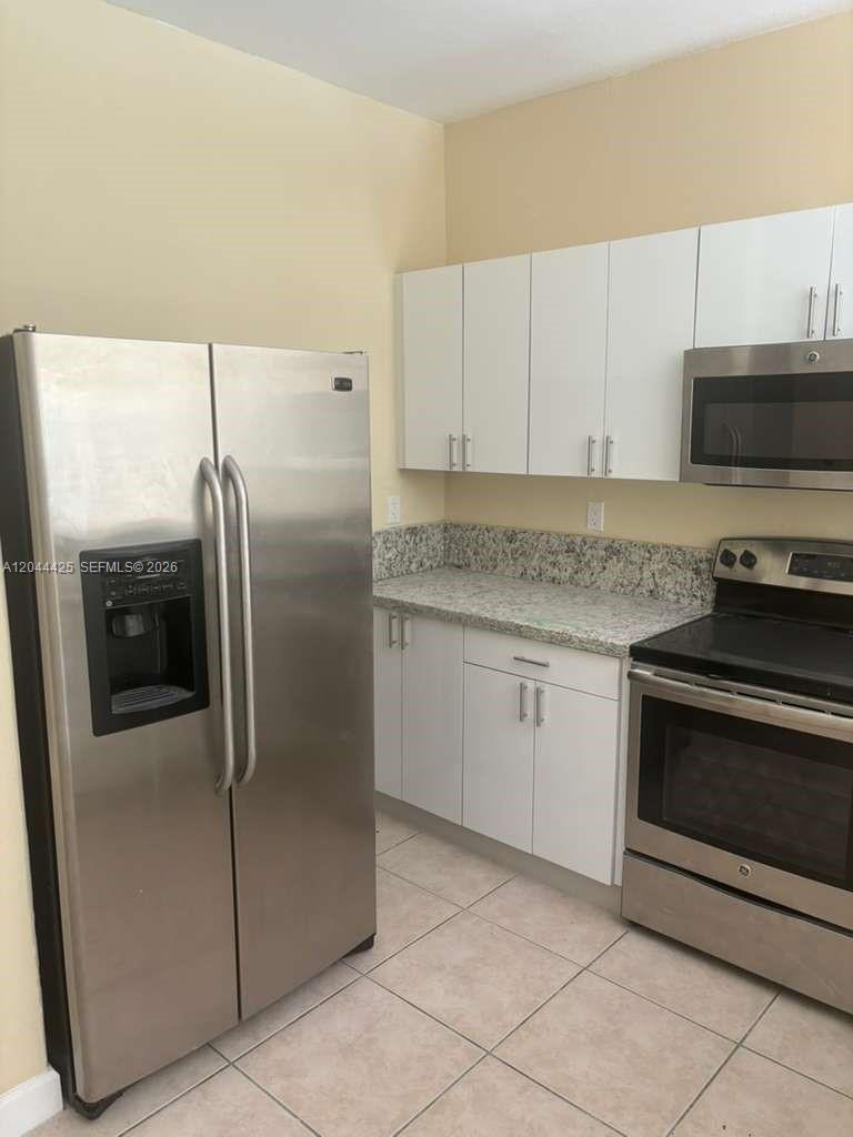 1663 Se 27th Drive 207 Property Photo 1