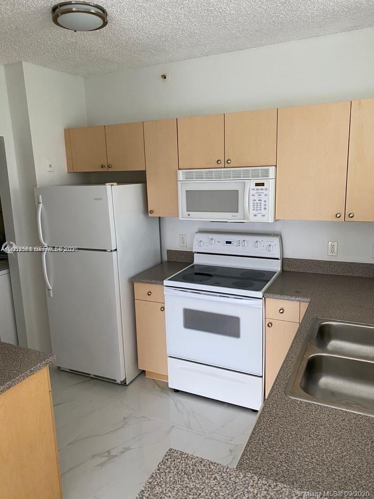 7980 N Nob Hill Road 102 Property Photo 3