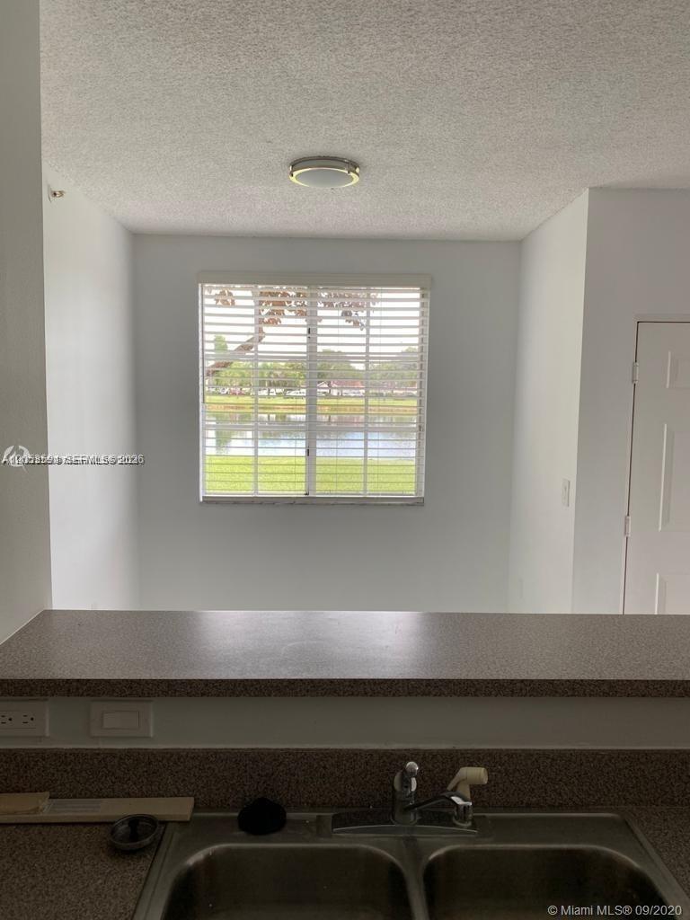 7980 N Nob Hill Road 102 Property Photo 5