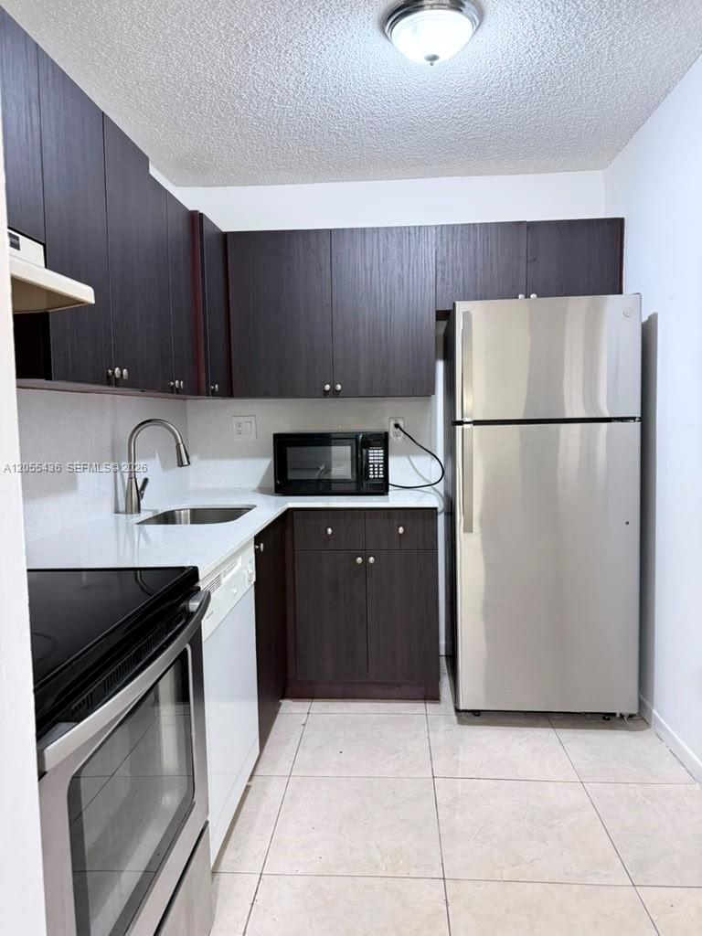 7090 NW 179th Street 107 Property Photo 1