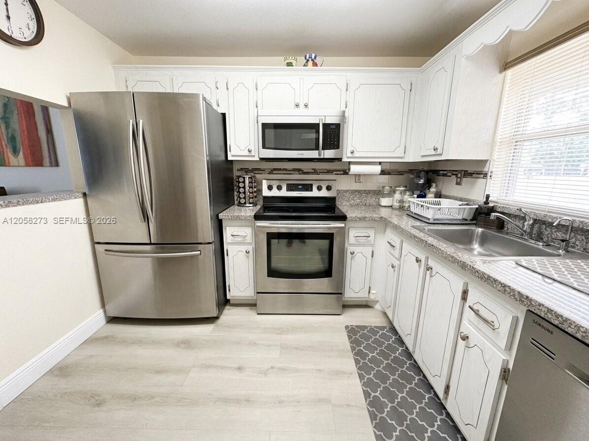 9801 Sunrise Lakes Boulevard 203 Property Photo 1