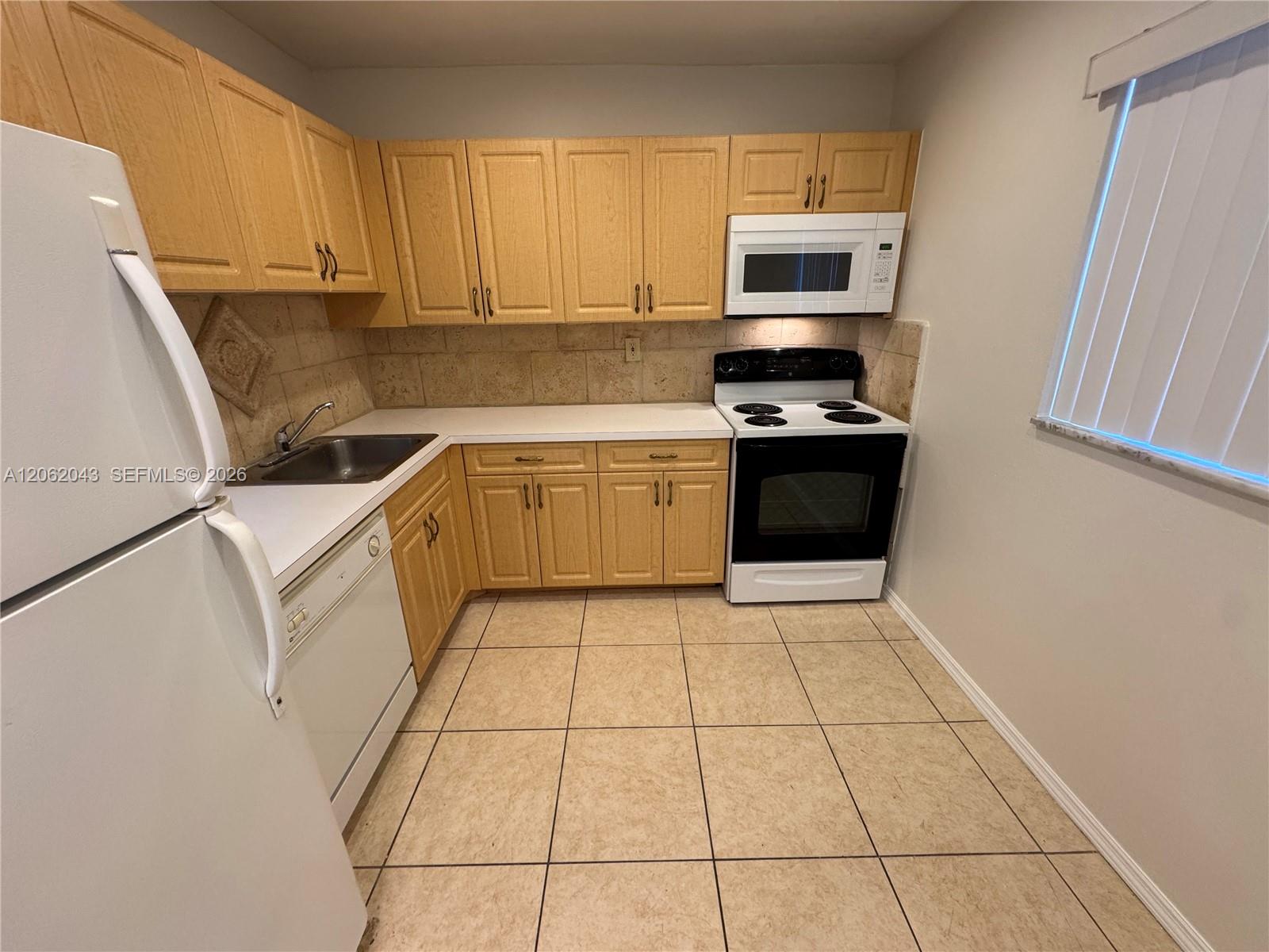 7700 Camino Real D-407 Property Photo 1