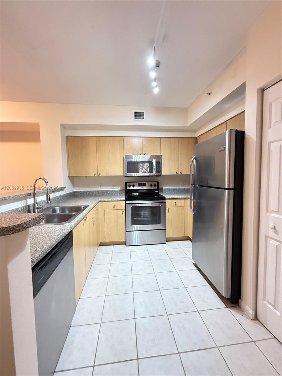 7940 N Nob Hill Road 204 Property Photo 1