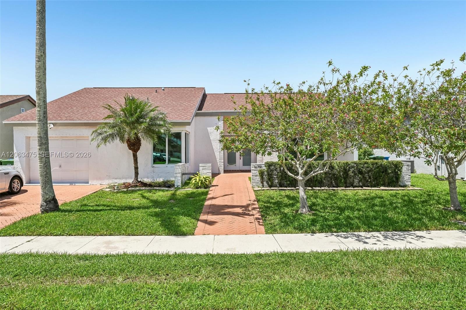 16791 Royal Poinciana Drive Property Photo 1