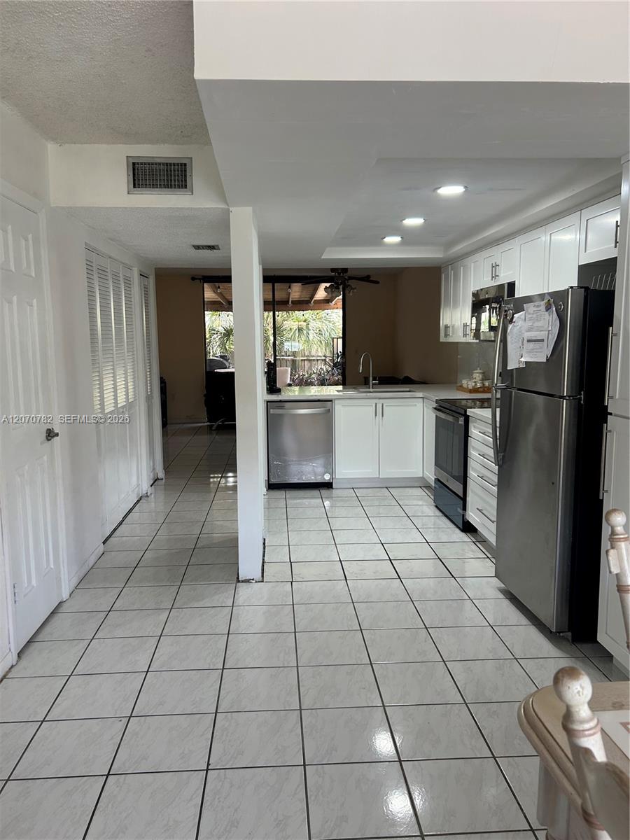 12242 Sw 16th Terrace 102-l Property Photo 1