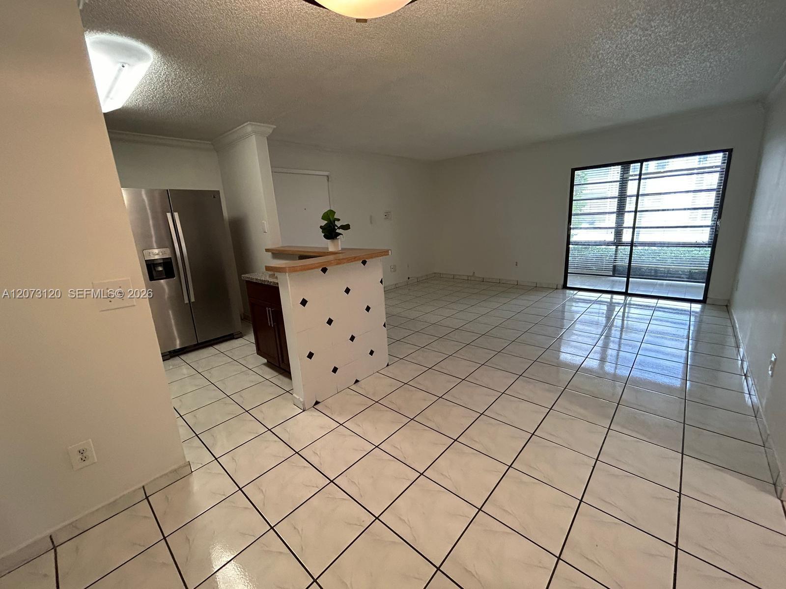 9729 Hammocks Boulevard 105e Property Photo 6