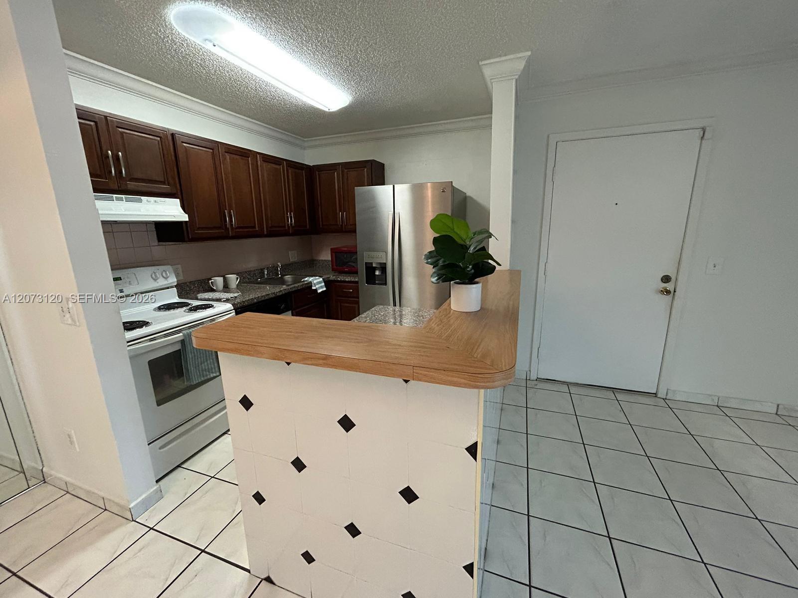 9729 Hammocks Boulevard 105e Property Photo 8