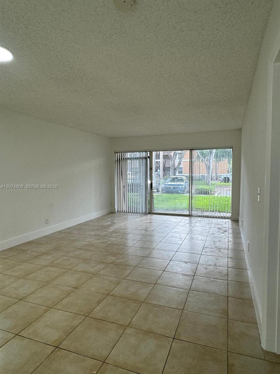 8801 Wiles Road 103 Property Photo 1