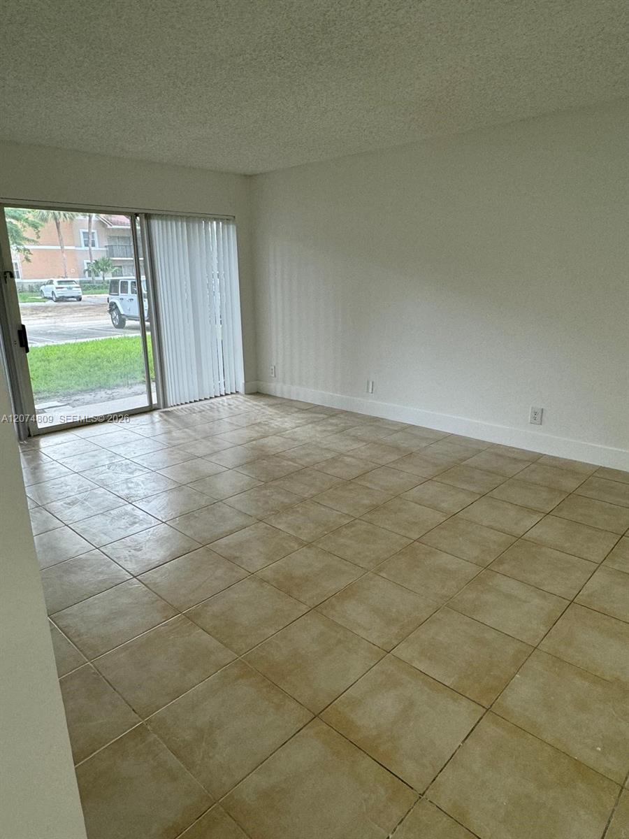 8801 Wiles Road 103 Property Photo 2
