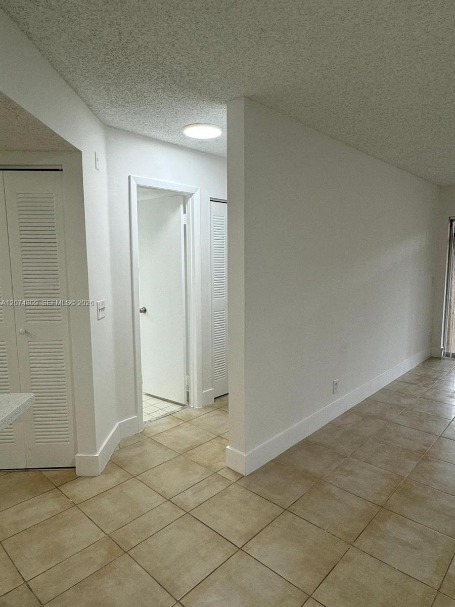 8801 Wiles Road 103 Property Photo 4