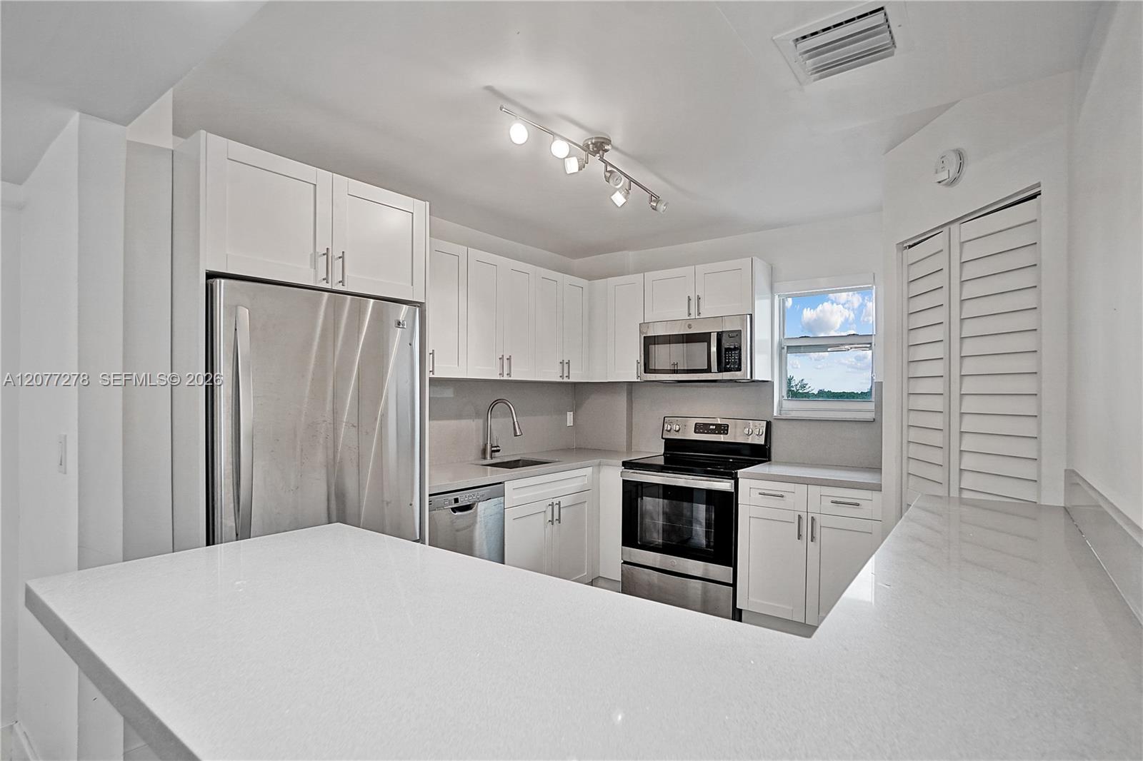9273 Collins Avenue 309 Property Photo 1