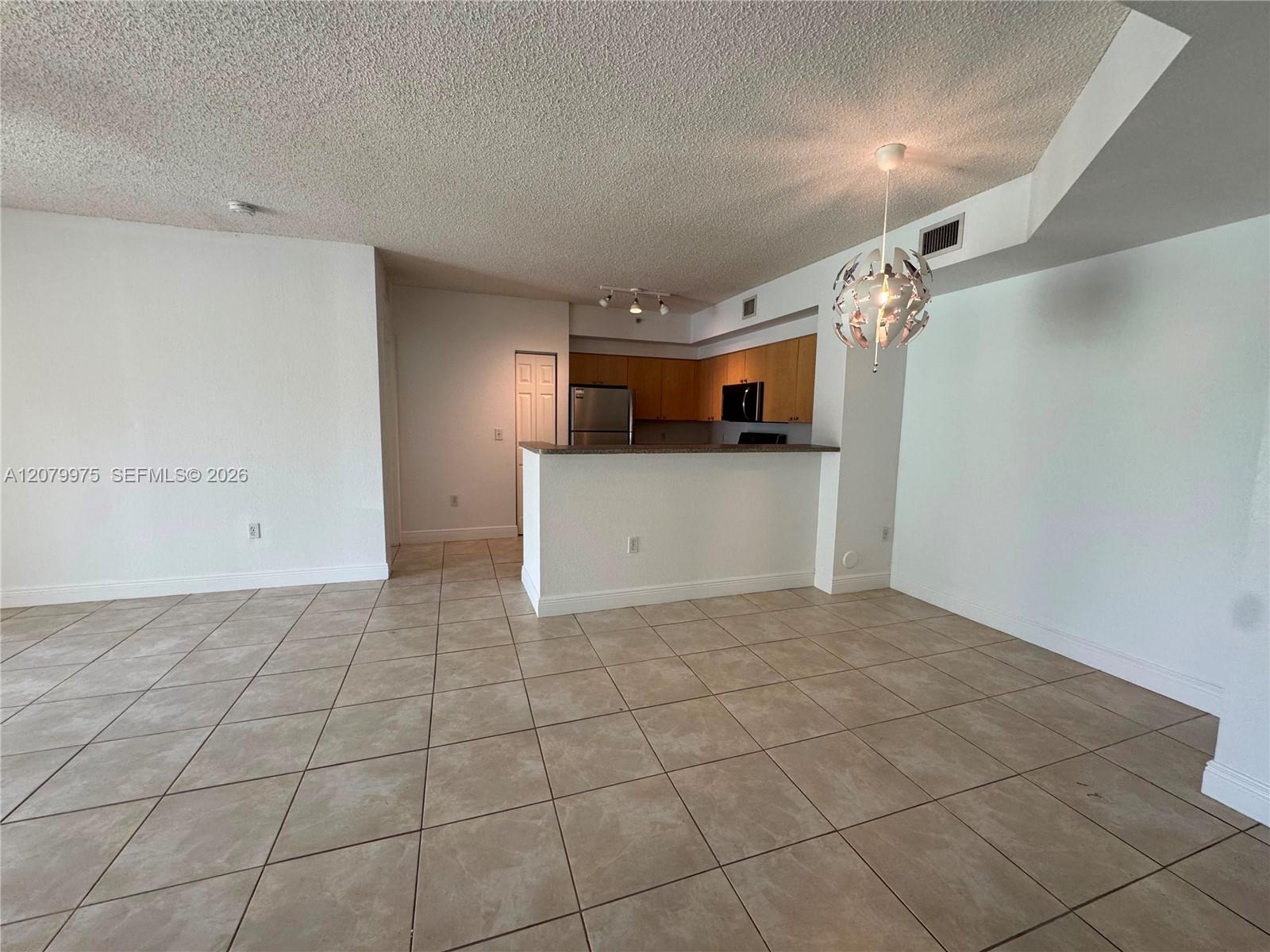 7920 N Nob Hill Road 103 Property Photo 10