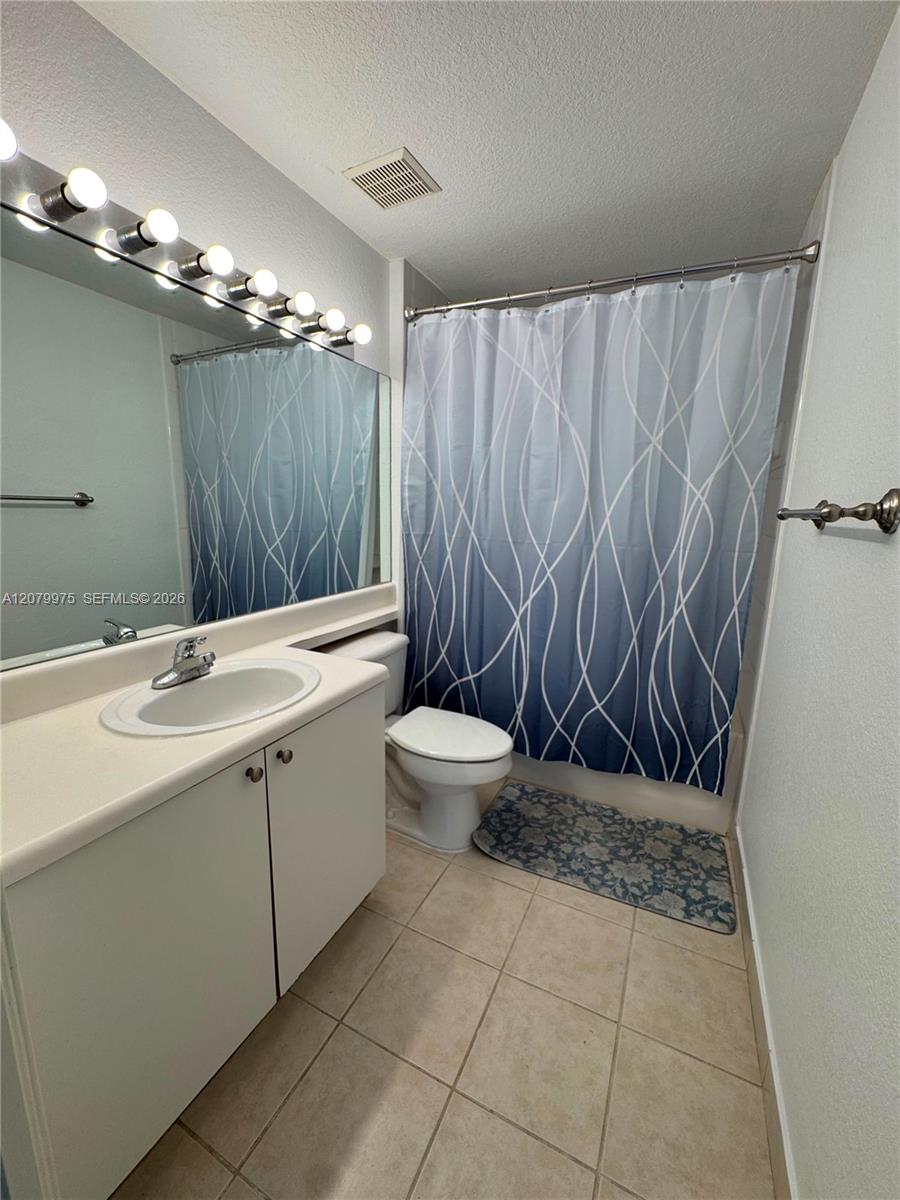 7920 N Nob Hill Road 103 Property Photo 13