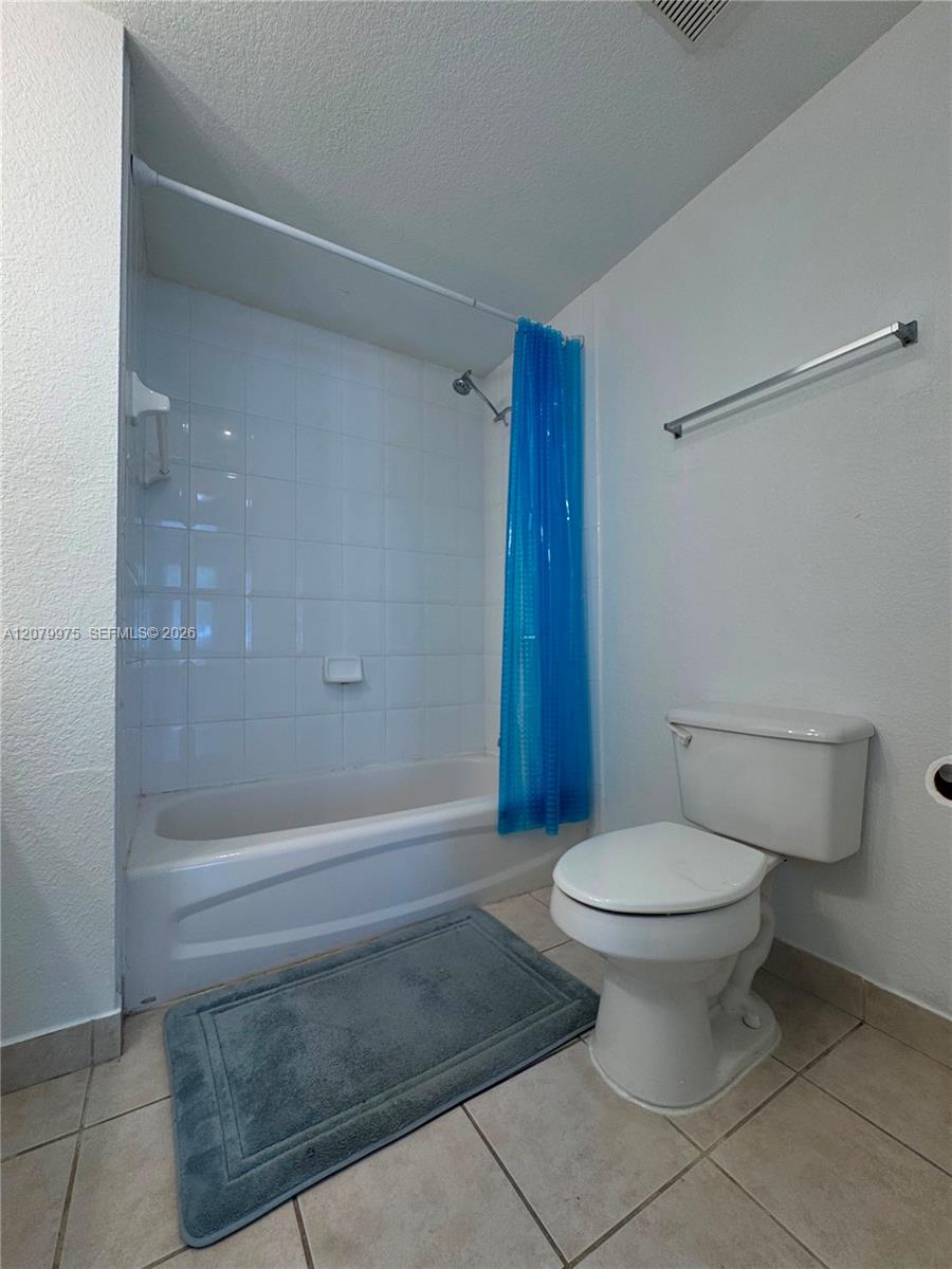 7920 N Nob Hill Road 103 Property Photo 14