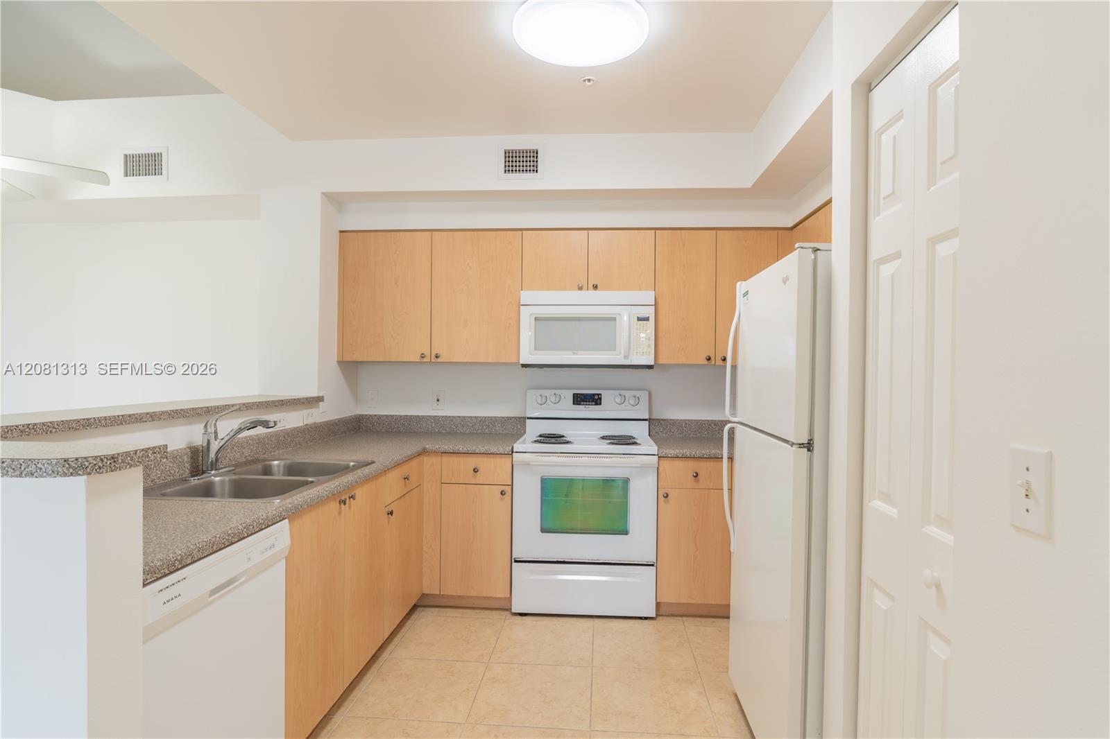 7920 N Nob Hill Road 305 Property Photo 1