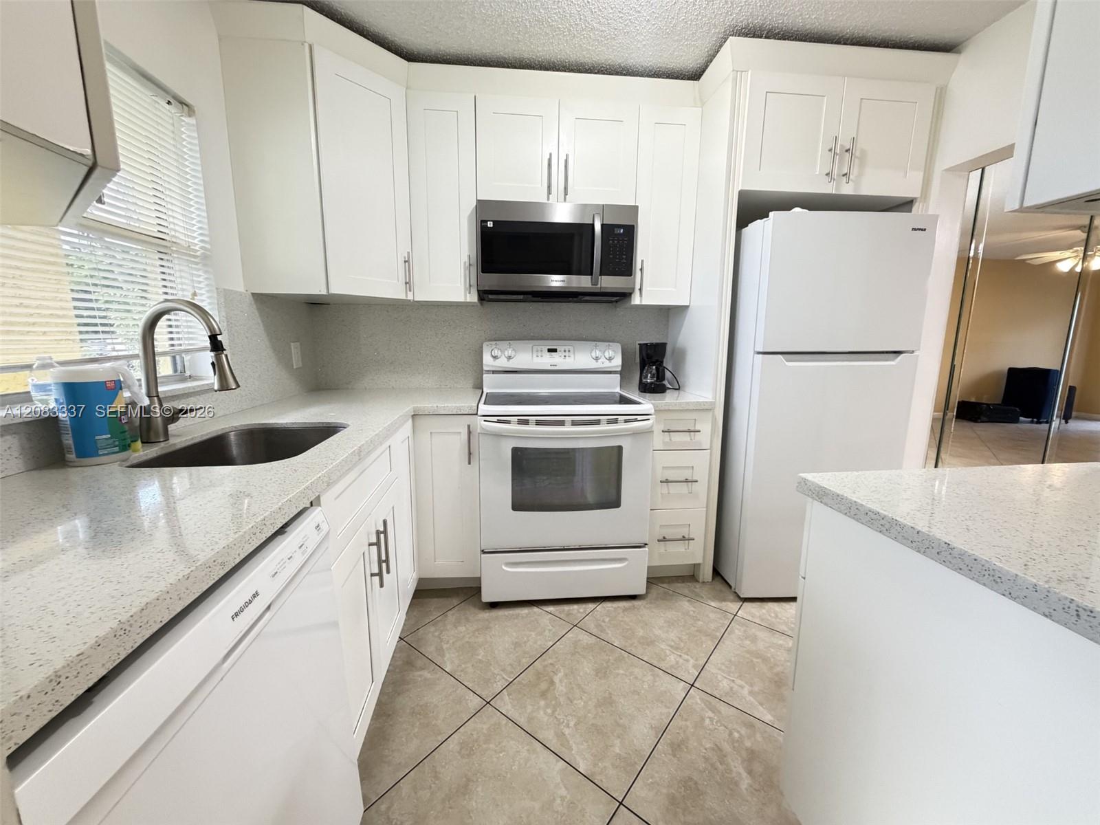 9949 Sandalfoot Boulevard 514 Property Photo 1