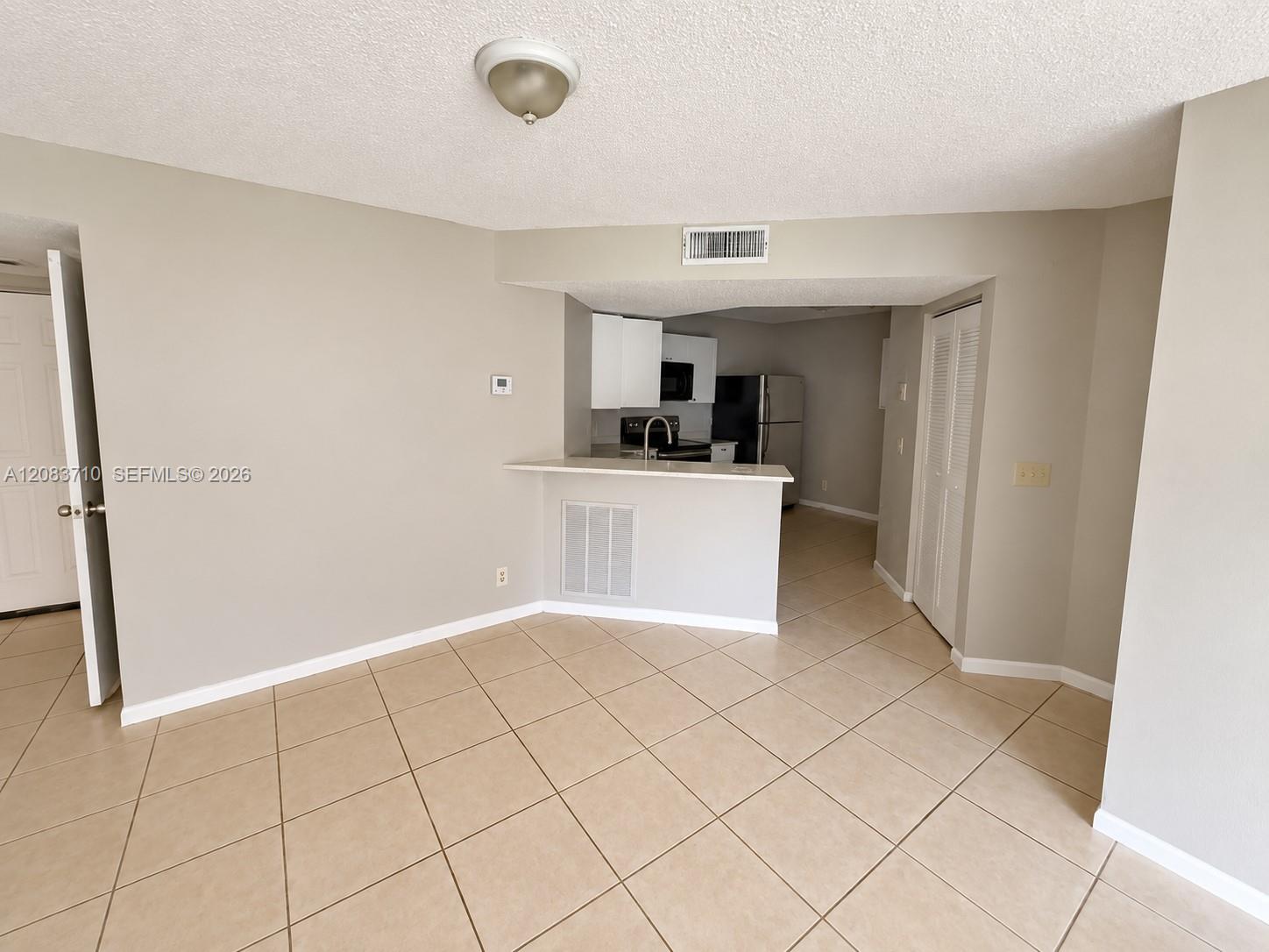 8821 Wiles Road 102 Property Photo 5