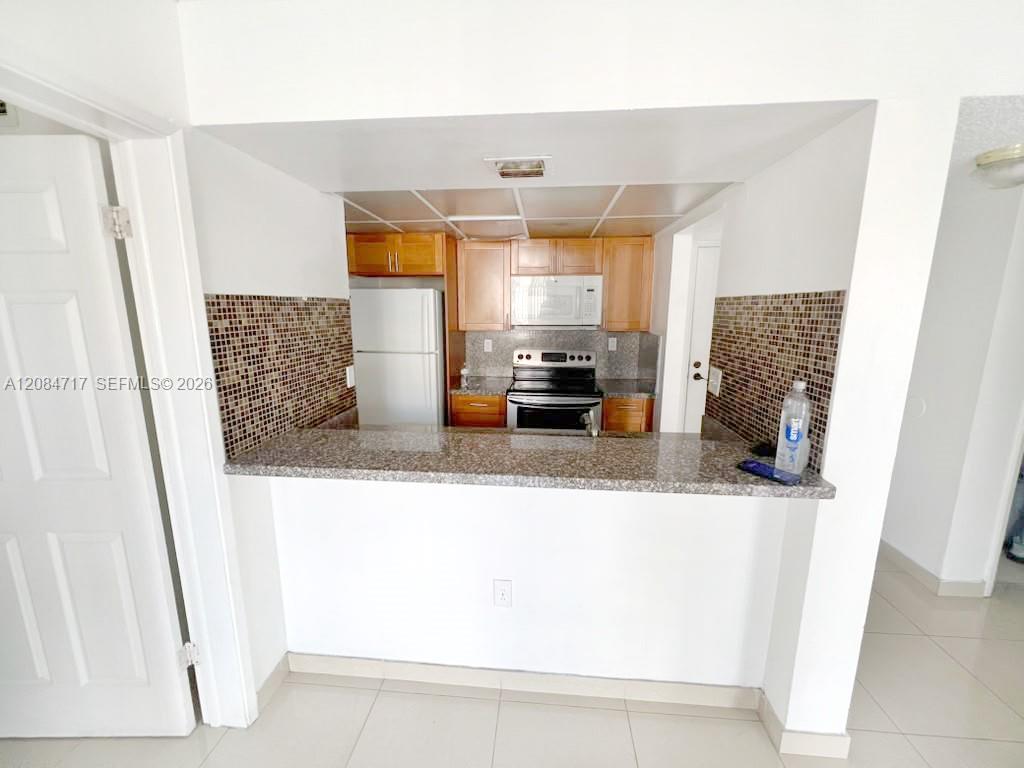 6995 NW 186th Street E211 Property Photo 1