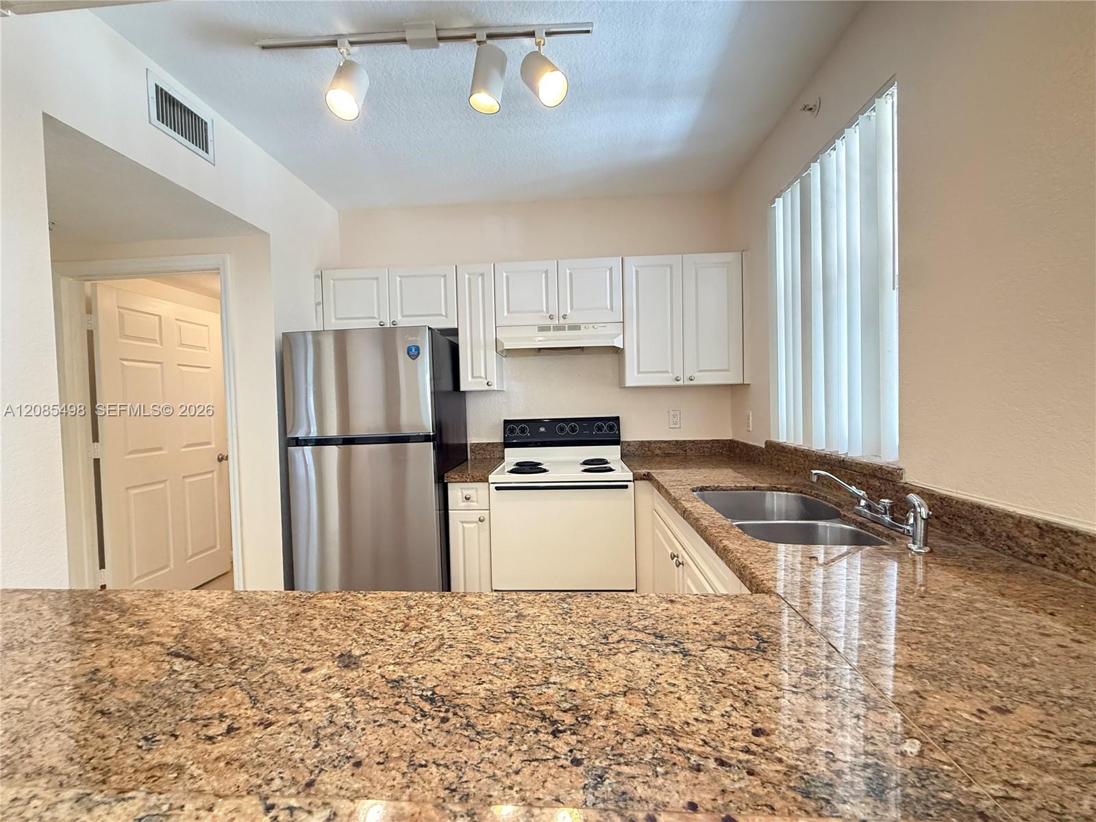 6796 W Sample Road 6796 Property Photo 1
