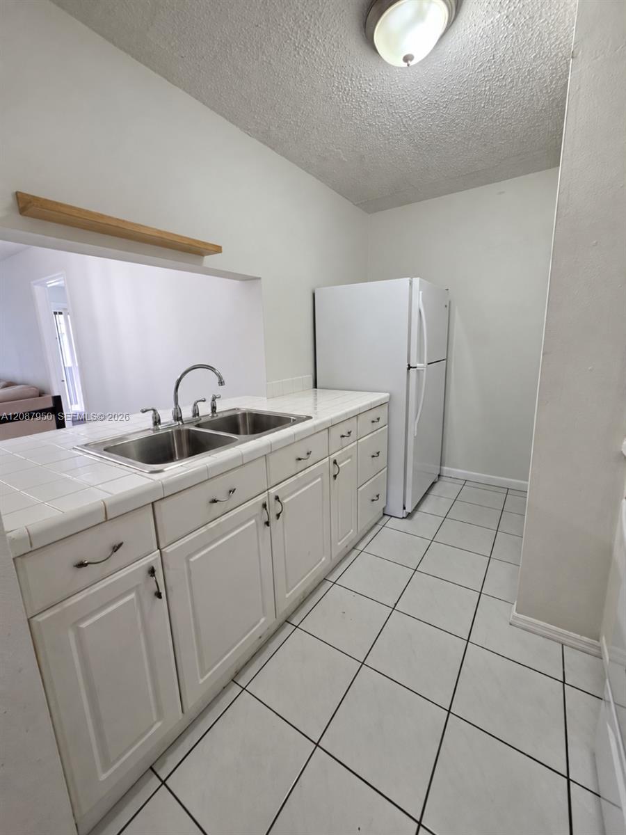 9708 Hammocks Boulevard 101-32 Property Photo 6