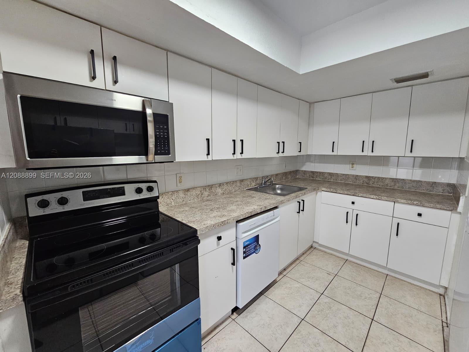 2207 Nw 59th Avenue 73-e Property Photo 4