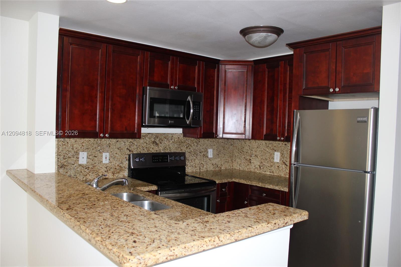 4871 Via Palm Lakes 703 Property Photo 1