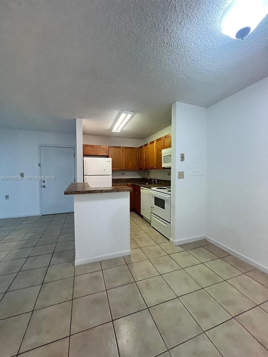 6975 NW 179th Street 202 Property Photo 1