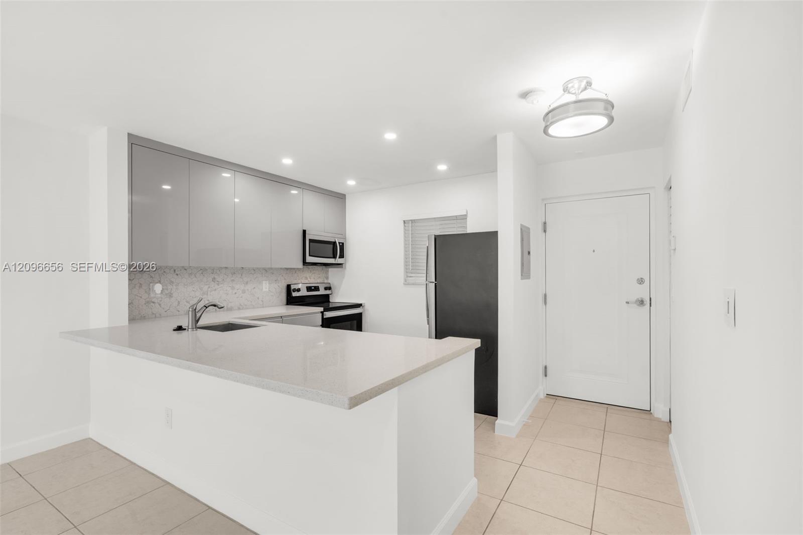 7705 Camino Real B101 Property Photo 1