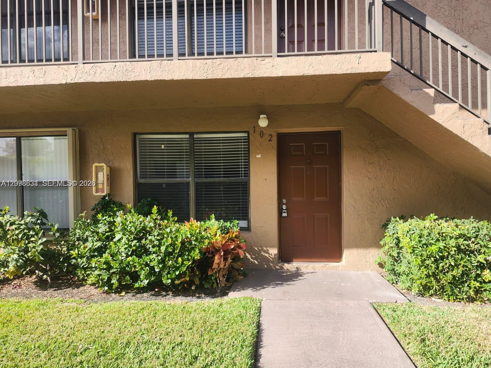 10037 Winding Lake Road 102 Property Photo 1