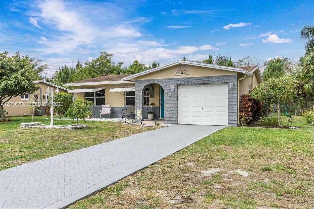 4871 Nw 13th Avenue Property Photo 1