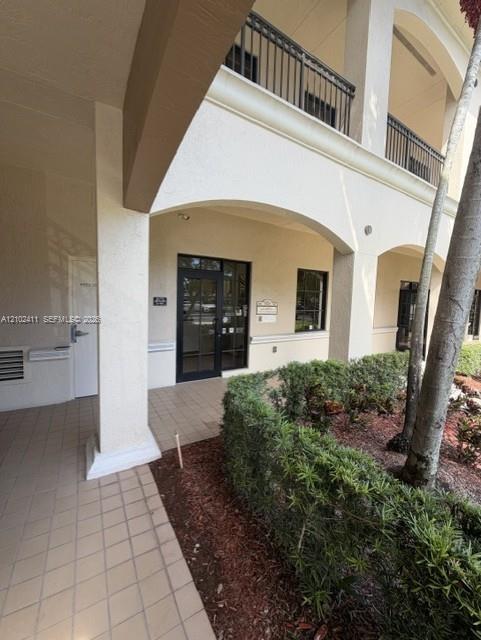 7501 Wiles Road 102-a Property Photo 1