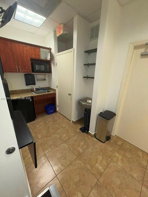 7501 Wiles Road 102-a Property Photo 5